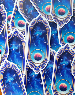 A bunch of star sign libra constellation holographic stickers in blue and red.