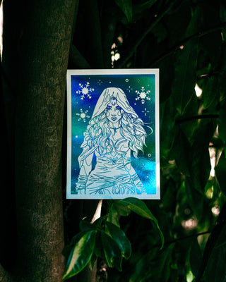 A winter fairy with snowflakes on a tree in a forest