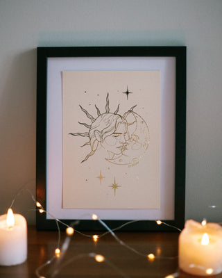 Once Upon A Kiss foil art print in gold foil on cream card, a man kissing the moon, fantasy romance wall art for book lovers
