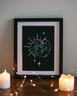 Once Upon A Moon art print in holographic silver foil on black card, a girl kissing the moon