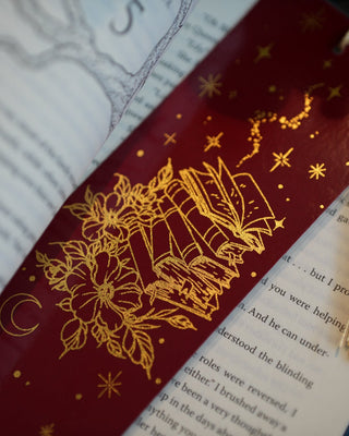Book bookmark with tassel on an open book