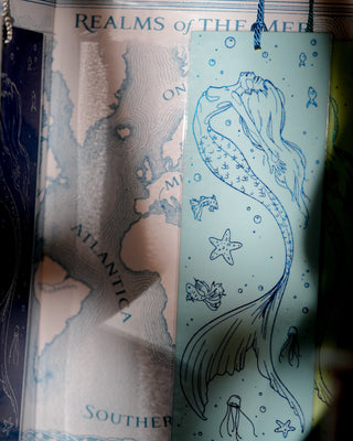 Mermaid bookmark with starfish design on a map background