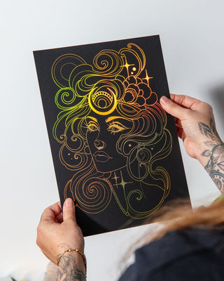 Selene Greek goddess of the moon foil art print in holographic gold on black card, held in hand, lunar wall art handcrafted in Melbourne