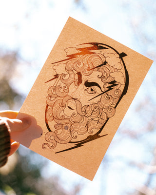 An art print of Zeus held against a blurred natural background