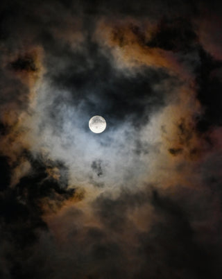 Full Moon surrounded by smoke