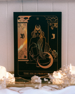Decorative any print with 'The High Priestess' tarot card design on a white surface with candles.